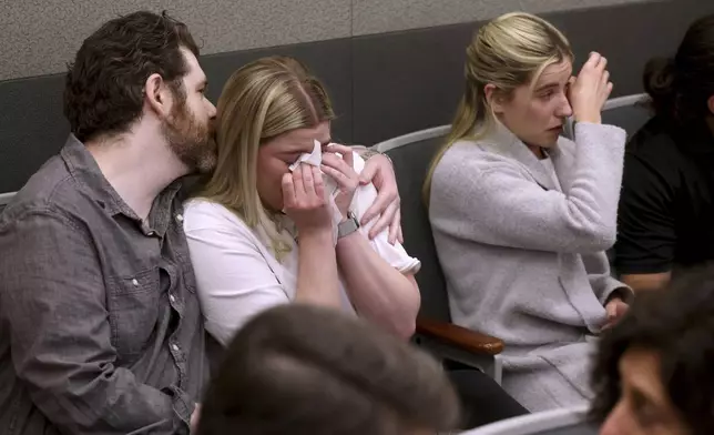 Family members of Jeff German react to the guilty verdict in Robert Telles' murder trial at the Regional Justice Center in Las Vegas Wednesday, Aug. 28, 2024. Telles, a former Clark County public administrator, was found guilty in the stabbing death of German, a Las Vegas Review-Journal investigative journalist. (K.M. Cannon/Las Vegas Review-Journal via AP)/Las Vegas Review-Journal via AP, Pool)