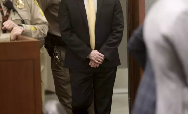 Robert Telles walks into the courtroom from an in custody area for the verdict in his murder trial at the Regional Justice Center in Las Vegas Wednesday, August 28, 2024. Telles, a former Clark County public administrator, was found guilty in the stabbing death of Las Vegas Review-Journal investigative journalist Jeff German. (K.M. Cannon/Las Vegas Review-Journal, Pool)/Las Vegas Review-Journal via AP)/Las Vegas Review-Journal via AP, Pool)