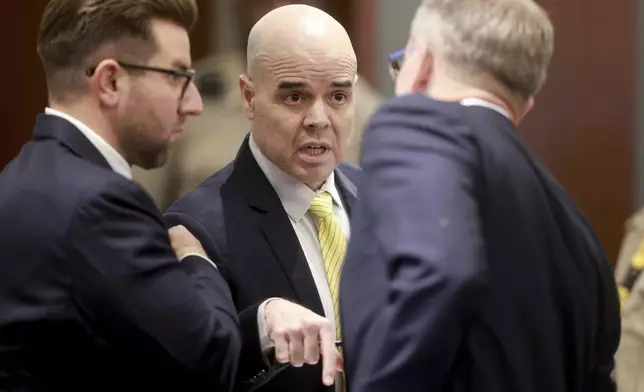 Robert Telles talks to his attorneys Michael Horvath, left, and Robert Draskovich in the courtroom during a break in proceedings on the fourth day of his murder trial at the Regional Justice Center in Las Vegas Thursday, August 15, 2024. Telles, a former Clark County public administrator, is charged in the murder of Las Vegas Review-Journal investigative journalist Jeff German and has pleaded not guilty. (K.M. Cannon/Las Vegas Review-Journal via AP, Pool)