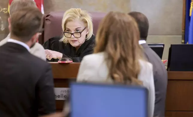 District Judge Michelle Leavitt discusses a written note from a juror during testimony from Robert Telles during his murder trial at the Regional Justice Center in Las Vegas, Friday, Aug. 23, 2024. Telles, a former Clark County public administrator, is charged in the murder of Las Vegas Review-Journal investigative journalist Jeff German. (K.M. Cannon/Las Vegas Review-Journal via AP)