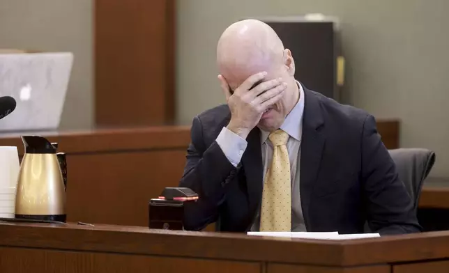 Robert Telles weeps during his narrative on the witness stand during his murder trial at the Regional Justice Center in Las Vegas, Thursday, Aug. 22, 2024. (K.M. Cannon/Las Vegas Review-Journal via AP, Pool)