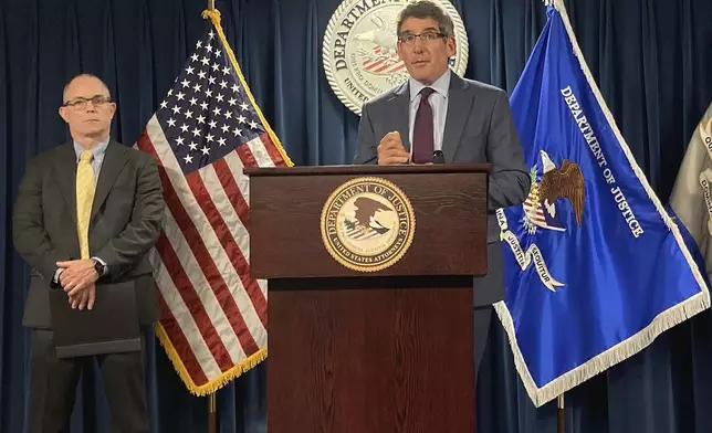 Acting United States Attorney for the District of Massachusetts Joshua Levy, right, takes questions from reporters as FBI Assistant Special Agent in Charge Stephen Kelleher, left, looks on during a news conference Wednesday, Aug. 28, 2024, in Boston, held to announce the arrest of former Stoughton Police Detective Matthew Farwell on murder charges. (AP Photo/Steven LeBlanc)