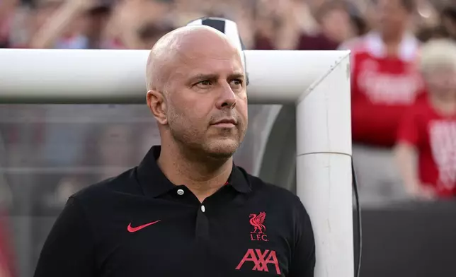 Liverpool manager Arne Slot looks on from the sidelines prior to an international friendly soccer match against Arsenal, Wednesday, July 31, 2024, in Philadelphia. (AP Photo/Derik Hamilton)