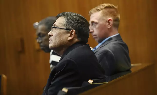 Defendants, John Seiberling, foreground, Gaven King, middle, and Aaron Maree, Northland Mall security guards were charged with killing McKenzie Cochran at the mall. Oakland County Circuit on Tuesday, Aug. 20, 2024, in Pontiac, Mich. (Clarence Tabb, Jr./Detroit News via AP)