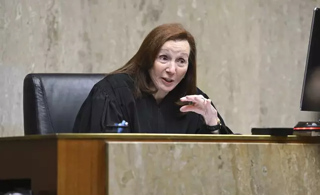 Oakland County Circuit Judge Martha D. Anderson respondes to an objection from a defense attorney during the involuntary manslaughter trial of three Northland Mall security guards who were charged with killing a black man at the mall. Oakland County Circuit on Tuesday, Aug. 20, 2024, in Pontiac, Mich. (Clarence Tabb, Jr./Detroit News via AP)