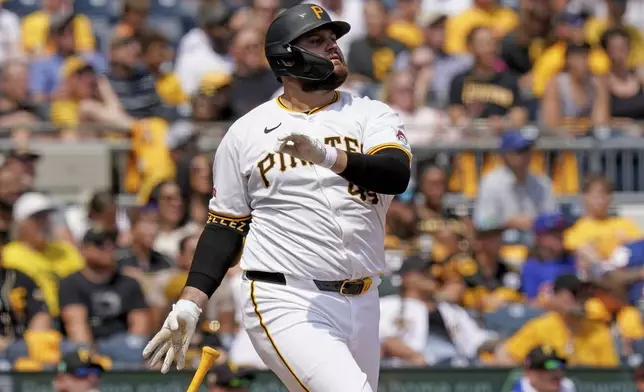 Pittsburgh Pirates' Rowdy Tellez watches his two-run home run during the fourth inning of a baseball game against the Seattle Mariners, Saturday, Aug. 17, 2024, in Pittsburgh. (AP Photo/Matt Freed)