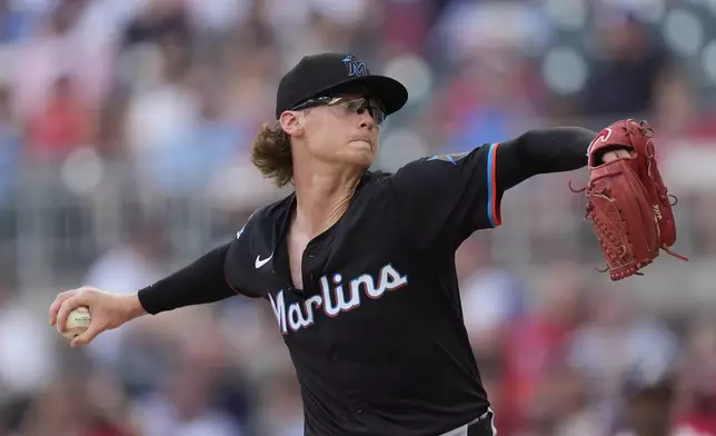 Miami Marlins starting pitcher Max Meyer delivers to an Atlanta Braves batter in the first inning of a baseball game, Thursday, Aug. 1, 2024, in Atlanta. (AP Photo/John Bazemore)