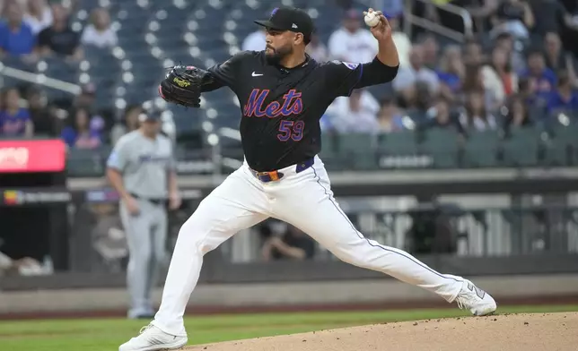 New York Mets' Sean Manaea pitches during the first inning of a baseball game against the Miami Marlins, Friday, Aug. 16, 2024, in New York. (AP Photo/Pamela Smith)