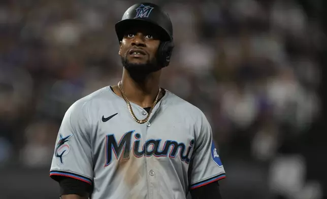 Miami Marlins' Otto Lopez reacts after grounding out to New York Mets first baseman Pete Alonso during the sixth inning of a baseball game, Friday, Aug. 16, 2024, in New York. (AP Photo/Pamela Smith)