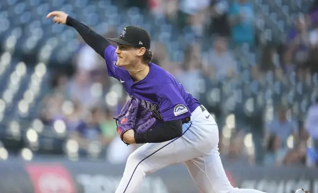 Colorado Rockies starting pitcher Ryan Feltner works agianst the Miami Marlins in the first inning of a baseball game Monday, Aug. 26, 2024, in Denver. (AP Photo/David Zalubowski)