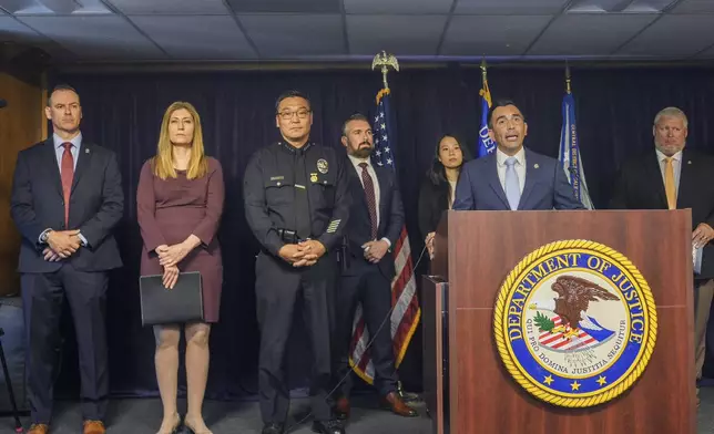 United States Attorney Martin Estrada, at podium, is joined by officials from left: Acting Inspector in Charge of the U.S. Postal Inspection Service's Los Angeles Division, Matthew Shields, Los Angeles Police Chief Dominic Choi, DEA Administrator Anne Milgram, and other officials to announce court filings related to the death of actor Matthew Perry in Los Angeles on Thursday, Aug. 15, 2024. (AP Photo/Damian Dovarganes)