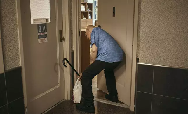 Ron Spitzer, stroke survivor, arrives home on Monday, July 15, 2024, in New York. (AP Photo/Andres Kudacki)