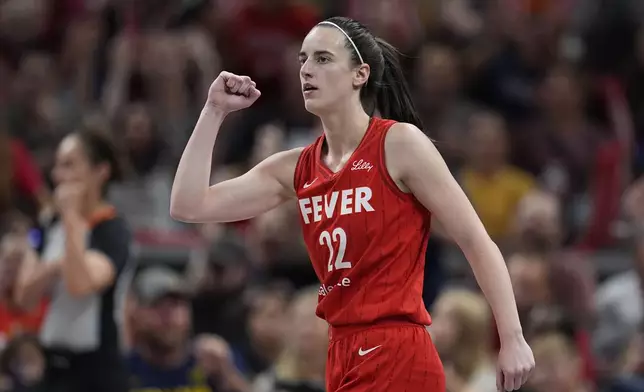 Indiana Fever guard Caitlin Clark reacts during the first half of a WNBA basketball game against the Phoenix Mercury, Friday, Aug. 16, 2024, in Indianapolis. (AP Photo/Darron Cummings)