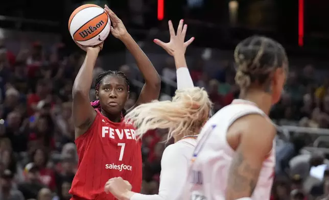 Indiana Fever's Aliyah Boston (7) shoots during the second half of a WNBA basketball game against the Phoenix Mercury, Friday, Aug. 16, 2024, in Indianapolis. (AP Photo/Darron Cummings)