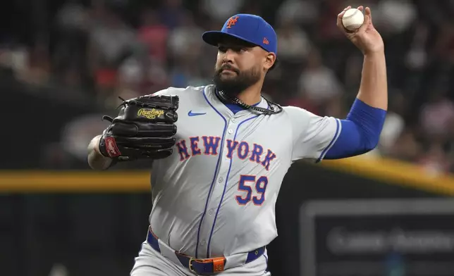 New York Mets' Sean Manaea throws against the Arizona Diamondbacks in the first inning during a baseball game, Tuesday, Aug 27, 2024, in Phoenix. (AP Photo/Rick Scuteri)