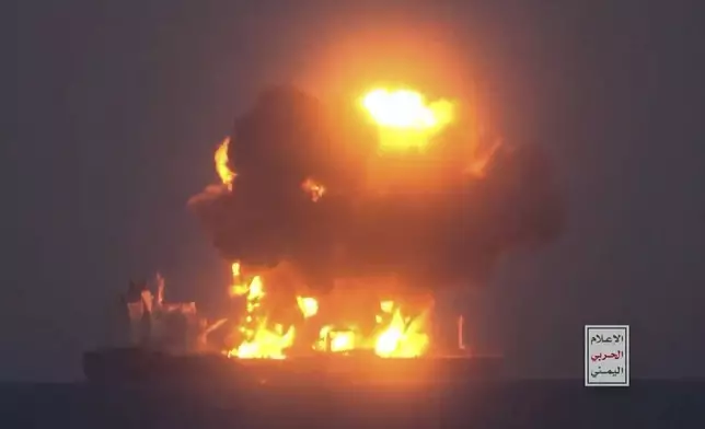 This frame grab from video released by the Ansar Allah Media Office, the media arm of Yemen's Houthi rebels, on Friday, Aug. 23, 2024, shows what the Houthis describe as one of their attacks on the Greek-flagged oil tanker Sounion in the the Red Sea. The logo in the bottom righthand corner of the image reads in Arabic: "Yemeni War Media." (Ansar Allah Media Office via AP)