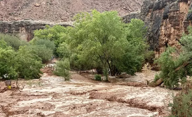 This photo provided by Michael Langer shows a flash flood at Grand Canyon National Park, Thursday, Aug 22, 2024 on the Havasupai Reservation in Arizona. (Michael Langer via AP)