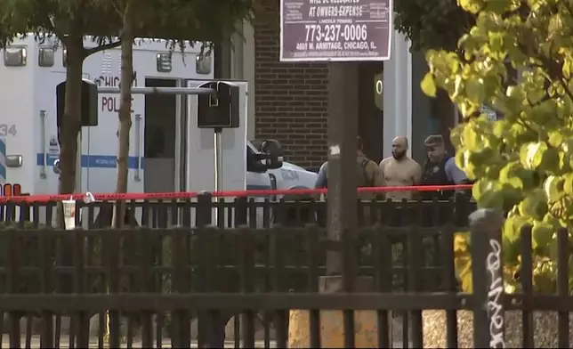 Joshua Zimmerman, who escaped from a Mississippi courthouse and is wanted on murder and armed robbery charges, is taken into custody following a standoff with police at a restaurant in Chicago on Wednesday, Aug. 21, 2024. (ABC 7 Chicago via AP)