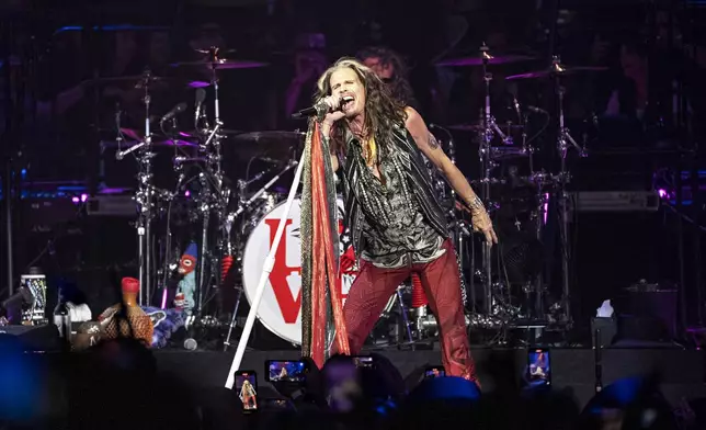 FILE - Steven Tyler of Aerosmith performs during night one of their "Peace Out: The Farewell Tour" on Sept. 2, 2023, at Wells Fargo Center in Philadelphia. The band said Friday, Aug. 2, 2024, that Tyler's voice has been permanently damaged by a vocal cord injury last year and the band will no longer tour. (Photo by Amy Harris/Invision/AP, File)