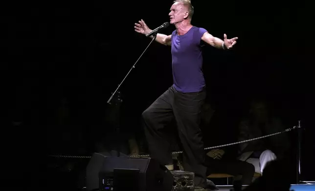 Sting performs in celebration of the 50th anniversary of Philippe Petit's World Trade Center Twin Towers high-wire walk at the Cathedral Church of St. John the Divine on Wednesday, Aug. 7, 2024, in New York. (Photo by Charles Sykes/Invision/AP)