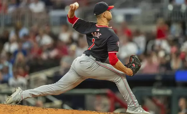 Washington Nationals pitcher MacKenzie Gore throws in the fourth inning of a baseball game against the Atlanta Braves, Friday, Aug. 23, 2024, in Atlanta. (AP Photo/Jason Allen)