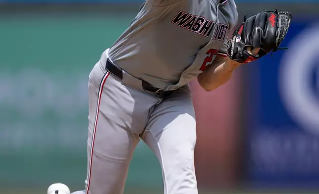 Washington Nationals starting pitcher Jake Irvin delivers during the first inning of a baseball game against the Philadelphia Phillies, Sunday, Aug. 18, 2024, in Philadelphia. (AP Photo/Chris Szagola)