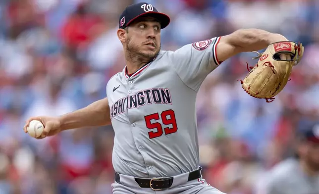 Washington Nationals relief pitcher Jacob Barnes delivers during the seventh inning of a baseball game against the Philadelphia Phillies, Sunday, Aug. 18, 2024, in Philadelphia. (AP Photo/Chris Szagola)