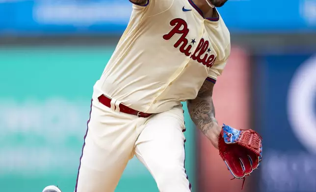 Philadelphia Phillies starting pitcher Taijuan Walker delivers during the first inning of a baseball game against the Washington Nationals, Sunday, Aug. 18, 2024, in Philadelphia. (AP Photo/Chris Szagola)