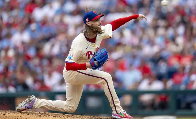 Philadelphia Phillies relief pitcher Matt Strahm delivers during the eighth inning of a baseball game against the Washington Nationals, Sunday, Aug. 18, 2024, in Philadelphia. (AP Photo/Chris Szagola)