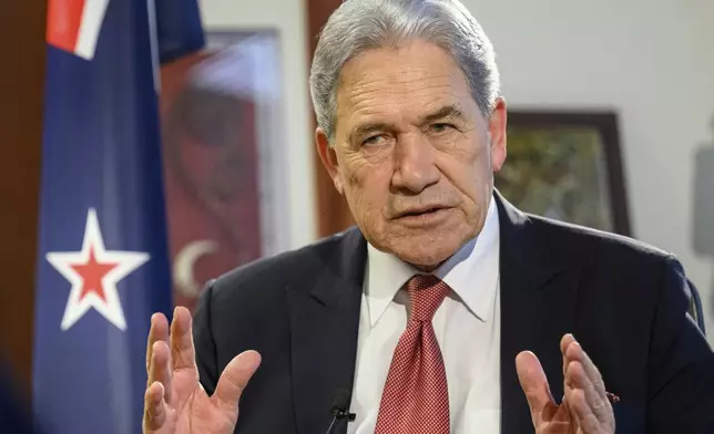 New Zealand Foreign Minister Winston Peters comments during an interview with The Associated Press in his parliamentary office in the capital, Wellington, Thursday, Aug. 22, 2024. (AP Photo/Mark Tantrum)