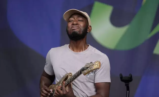 Isaiah Sharkey performs during the Newport Jazz Festival, Sunday, Aug. 4, 2024, in Newport, R.I. (AP Photo/Steven Senne)