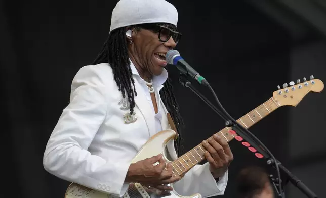 Nile Rodgers performs during the Newport Jazz Festival, Sunday, Aug. 4, 2024, in Newport, R.I. (AP Photo/Steven Senne)