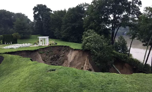 Storm damage on the grounds of The Waterview reception hall in Monroe, Conn., is shown Monday, Aug. 19, 2024. (Arnold Gold/Hearst Connecticut Media via AP)