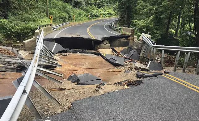 Damage from flood waters is shown on Cottage Street in Monroe, Conn., Monday, Aug. 19, 2024. (Arnold Gold/Hearst Connecticut Media)