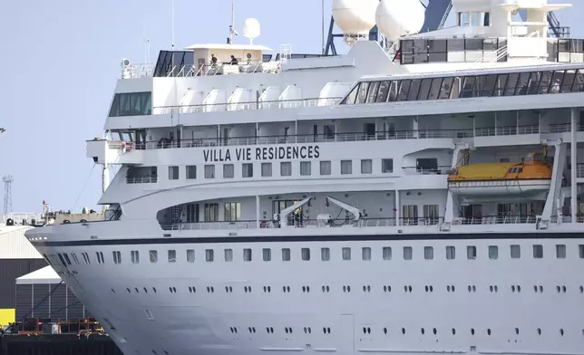 The Odyssey, a US cruise liner operated by Villa Vie Residences docked at Harland &amp; Wolf ship repair facility in Belfast Harbour, Northern Ireland, Friday, Aug. 30, 2024. (AP Photo/Peter Morrison)