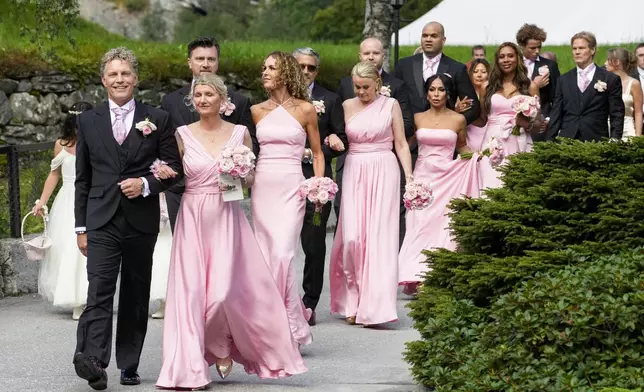 Bridesmaids attend the wedding of Norway's Princess Martha Louise and Durek Verrett, in Geiranger, Norway, Saturday Aug. 31, 2024. (Cornelius Poppe/NTB via AP)