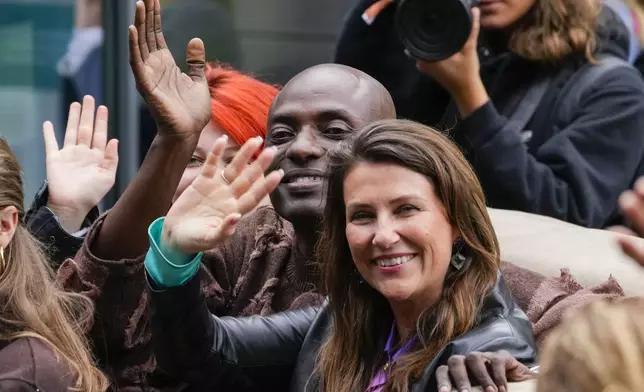 Norway's Princess Martha Louise and Durek Verret and guests arrive from Alesund to Geiranger, Norway, Friday Aug. 30, 2024, ahead of their wedding celebration on Saturday. (Cornelius Poppe/NTB via AP)