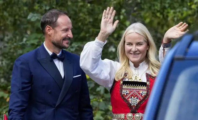 Norway's Crown Prince Haakon and Crown Princess Mette-Marit attend the wedding of Norway's Princess Martha Louise and Durek Verrett, in Geiranger, Norway, Saturday Aug. 31, 2024. (Cornelius Poppe/NTB via AP)