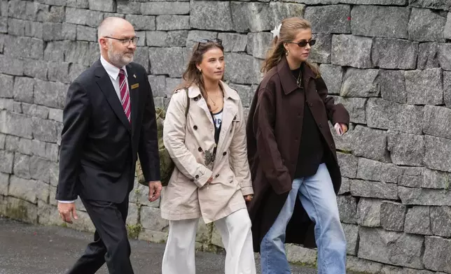 Daughters of Norway's Princess Martha Louise, Leah Isadora Behn and Emma Tallulah arrive in Geiranger, Norway, Friday Aug. 30, 2024, for the wedding celebration of Princess Martha Louise and Durek Verret on Saturday. (Heiko Junge/NTB via AP)