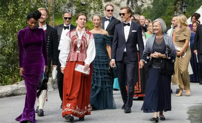 Guests attend the wedding of Norway's Princess Martha Louise and Durek Verrett, in Geiranger, Norway, Saturday Aug. 31, 2024. (Cornelius Poppe/NTB via AP)