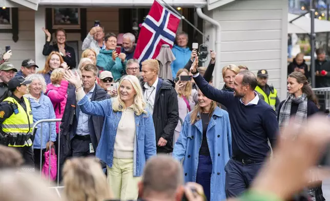 Norway's Crown Prince Haakon, 2nd right, Crown Princess Mette-Marit, center left, Princess Ingrid Alexandra, center right, Prince Sverre Magnus, 3rd right, and Amalie Giaever MacLeod arrive in Geiranger, Norway, Friday Aug. 30, 2024, ahead of the wedding celebration of Princess Martha Louise and Durek Verret on Saturday. (Cornelius Poppe/NTB via AP)