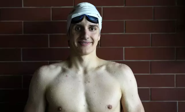 David Kratochvil, a teenage swimmer who prepares for the Paralympic Games in Paris, poses for a photo during his training in Tachov, Czech Republic, Wednesday, July 3, 2024. (AP Photo/Petr David Josek)