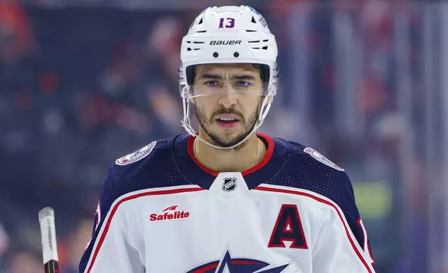 FILE - Columbus Blue Jackets' Johnny Gaudreau looks on during an NHL hockey game against the Philadelphia Flyers, Tuesday, April 11, 2023, in Philadelphia. (AP Photo/Chris Szagola, File)