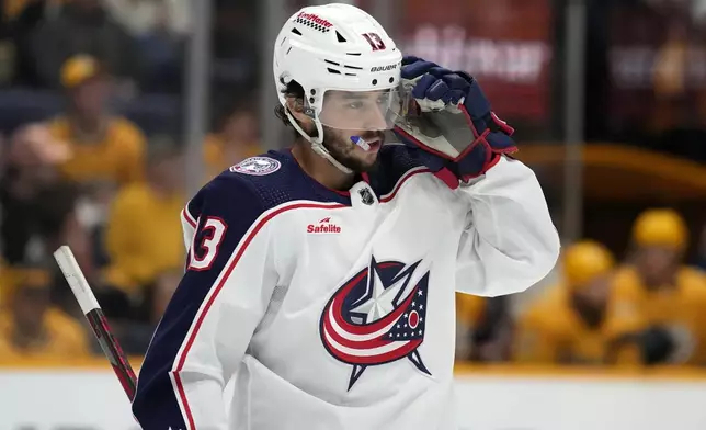 FILE - Columbus Blue Jackets' Johnny Gaudreau (13) plays against the Nashville Predators during the second period of an NHL hockey game Saturday, April 13, 2024, in Nashville, Tenn. (AP Photo/Mark Humphrey, File)