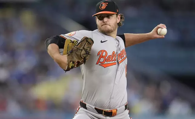 Baltimore Orioles starting pitcher Cole Irvin throws to a Los Angeles Dodgers batter during the first inning of a baseball game, Tuesday, Aug. 27, 2024, in Los Angeles. (AP Photo/Marcio Jose Sanchez)