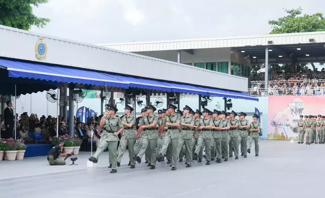 SJ reviews CSD passing-out parade  Source: HKSAR Government Press Releases