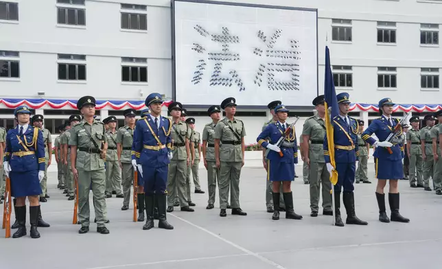 SJ reviews CSD passing-out parade  Source: HKSAR Government Press Releases