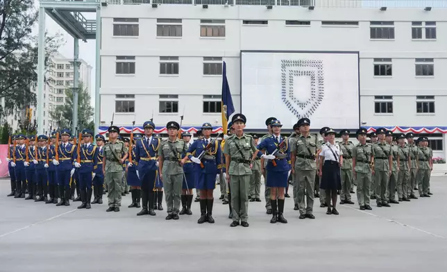 SJ reviews CSD passing-out parade  Source: HKSAR Government Press Releases