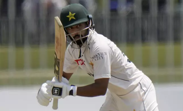 Pakistan's Saud Shakeel plays a shot during the second day of first cricket test match between Pakistan and Bangladesh, in Rawalpindi, Pakistan, Thursday, Aug. 22, 2024. (AP Photo/Anjum Naveed)