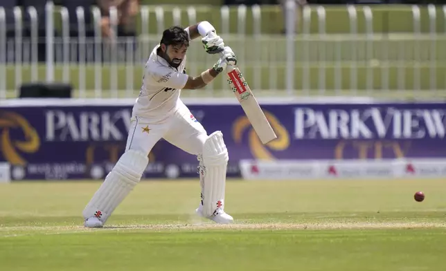 Pakistan's Mohammad Rizwan plays a shot during the second day of first cricket test match between Pakistan and Bangladesh, in Rawalpindi, Pakistan, Thursday, Aug. 22, 2024. (AP Photo/Anjum Naveed)